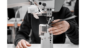 Machinist-using-industrial-sewing-machine