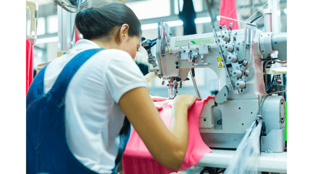 Woman-using-sewing-machine