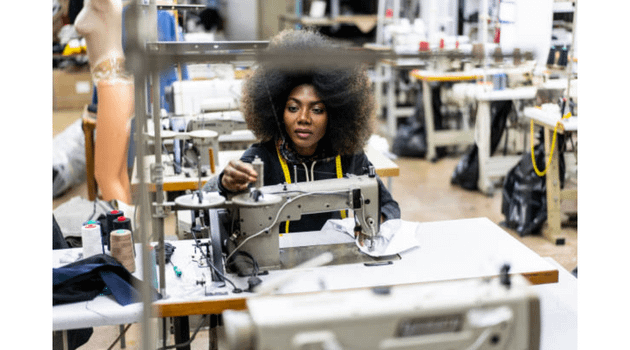 black-woman-using-industrial-sewing-machine